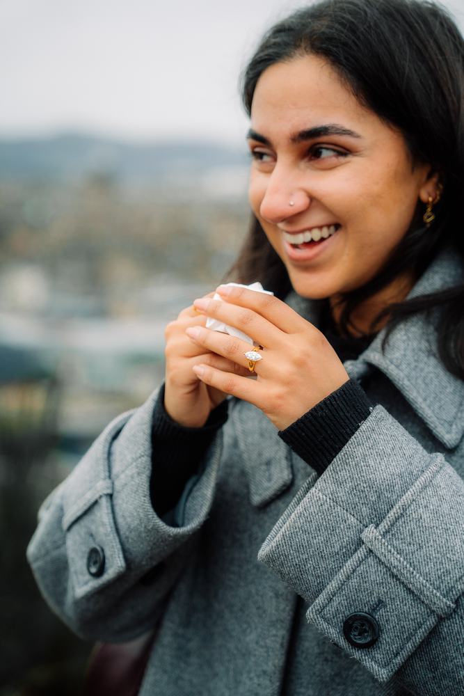 Woman laughing in disbelief after the proposal