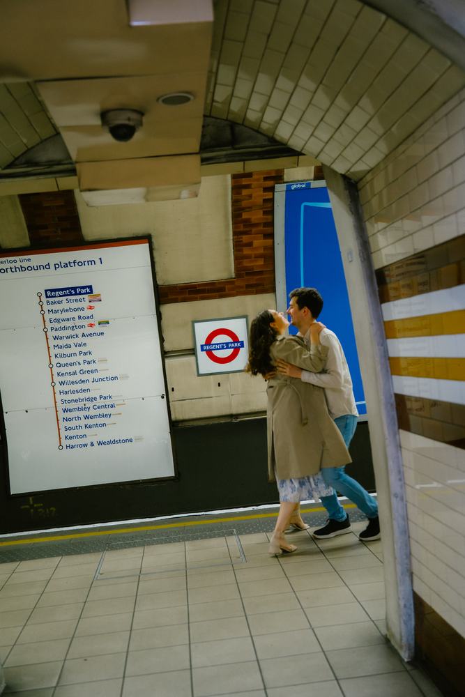 Couple dancing on a London Underground platform
