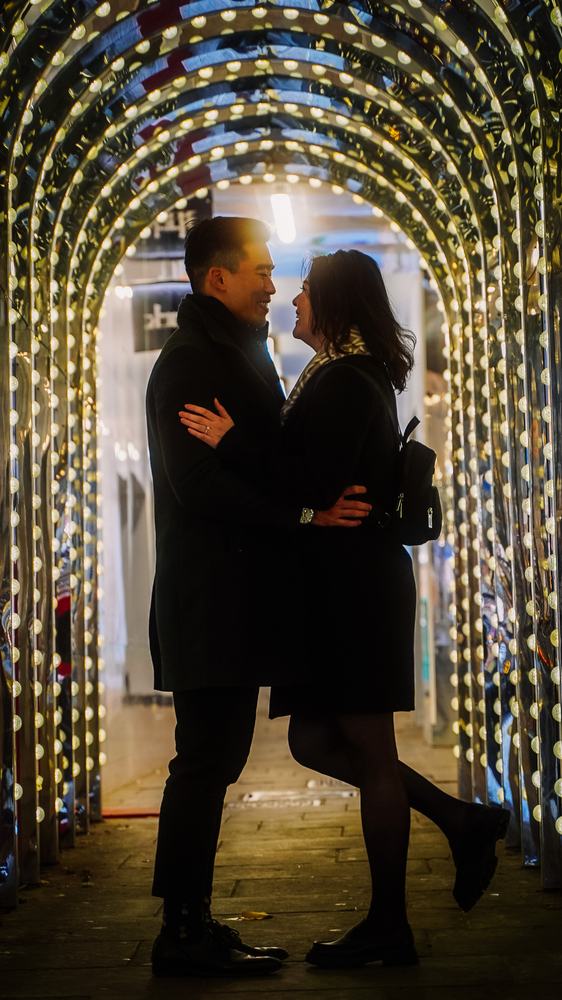 Couple in a tunnel of lights